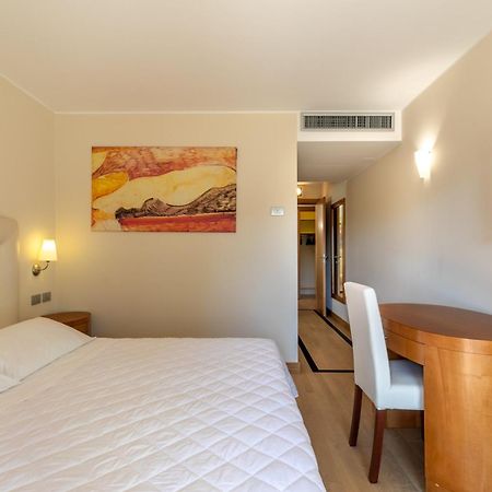 Hotel Villa Doimo Lignano Sabbiadoro Buitenkant foto