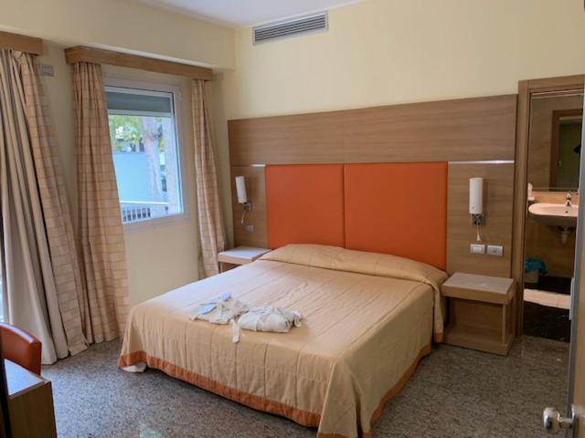 Hotel Villa Doimo Lignano Sabbiadoro Kamer foto