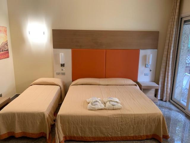 Hotel Villa Doimo Lignano Sabbiadoro Kamer foto